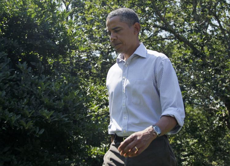 Bekymret. Præsident Obama på vej fra podiet efter sin tale om orkanen Irene. 