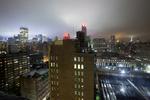 Orkan. New Yorks skyline med de truende skyer fra Irene i baggrunden. 