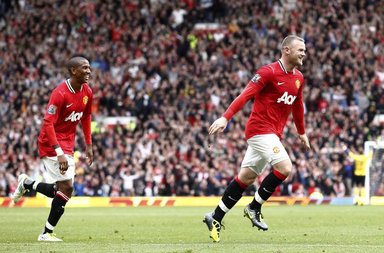 8-2. Tre af Uniteds mål blev scoret af Wayne Rooney. 