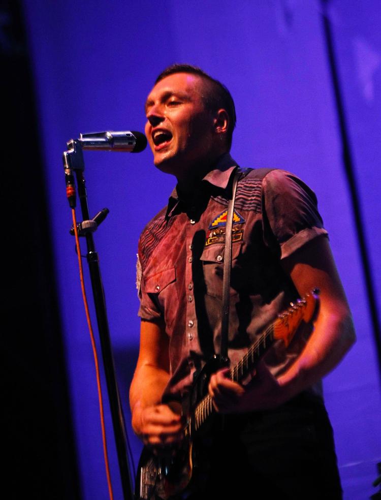 kompleks. Win Butler er 31 år og fremstår som en blanding af en lille, gammelklog dreng og en nostalgisk olding, og måske er det derfor, hans tekster borer sig ind og bliver siddende. Arkivfoto. 