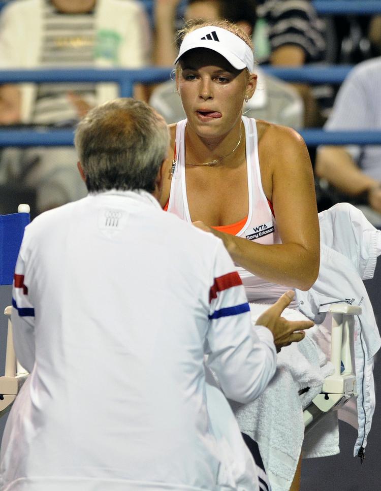 Team. Piotr Wozniacki assisterede med gode råd under turneringssejren i New Haven i sidste uge. 