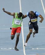 målfoto. Kirani James (t.v.) kom først. 