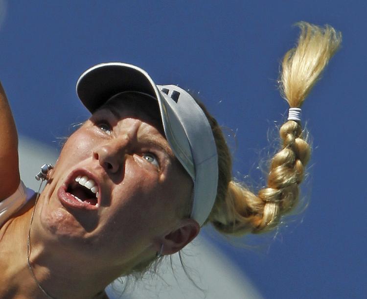 Vinder. Med sejren over Vives har sWozniacki spillet 18 grand slam-turneringer i træk uden at tabe i første runde. 
