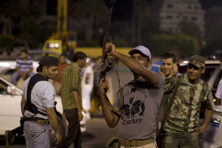 Gaddafisoldater fotograferet i Tripoli for godt to uger siden, da byen stadig var under diktatorens kontrol. 