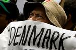 MUHAMMEDKRISE. Indonesisk demonstrant fotograferet ved den danske ambassade i Jakarta den 6. februar 2006. Protesterne fik amerikanerne til at beskytte dansk ambassadepersonale. 