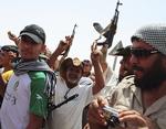 Kamp. Oprørere uden for Gaddafi-bastionen Bani Walid. 
