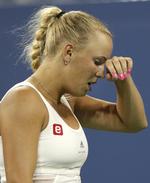 sorry. Caroline Wozniacki skal i kamp igen i aften - hvis vejret i New York altså tillader det. 