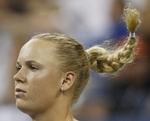 udspillet. Gang på gang måtte Caroline Wozniacki forgæves strække sig efter Serena Williams' vinderslag. 