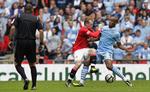 tvekamp. De to Manchester-klubber kører parløb i toppen af Premier League. 