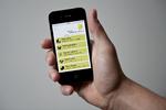 Smartphone med app'en 'Naturguide'