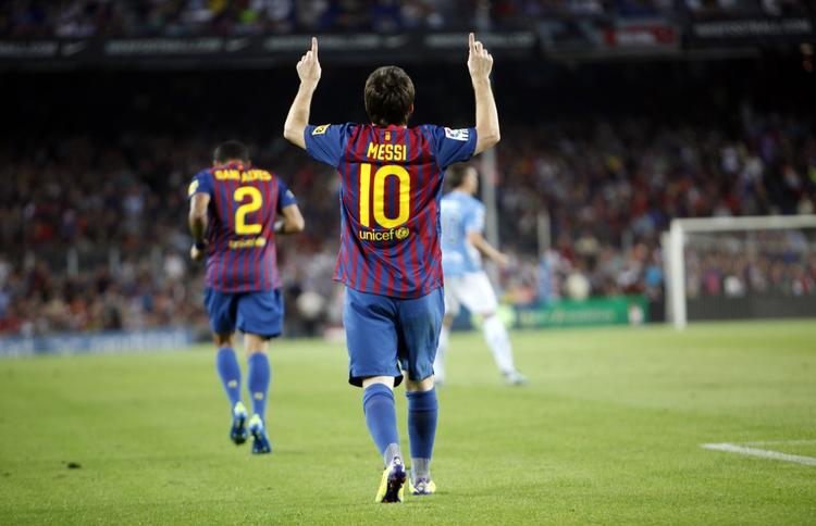 Jubel. Barcelonas store stjerne Lionel Messi scorede tre gange mod Osasuna i den spanske liga. 