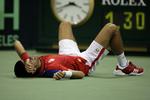 av. En smertende ankel kostede Novak Djokovic videre spil i Dvid Cup-semifinalen. 