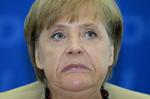 afstemning. Kansler Angela Merkel møder modstand mod et forslag om at styrke krisefond i sin egen regering. 