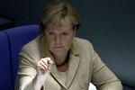 flertal. Det lykkedes den tyske kansler, Angela Merkel, at skaffe flertal for en polstring af EU's krisefond. 