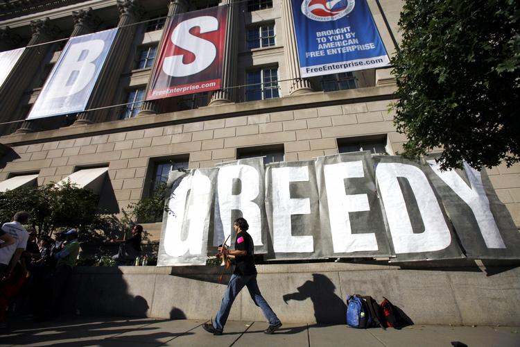 Grådighed. Amerikanerne er på gaden i over 70 byer for at demonstrere imod finansverdenen. 