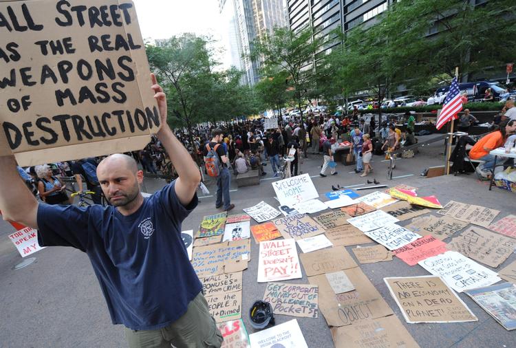 PROTEST. Occupy Wall Street-demonstranter i Zucotti Park, der nu kræves fjernet af parkens ejer. 