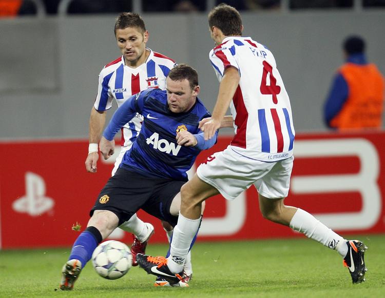 STJERNEN. Wayne Rooney blev Manchester Uniteds redningsmand i Rumænien. 