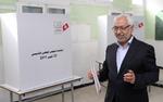 demokrati. Rachid Ghannouchi står i spidsen for Tunesiens største islamist-parti Ennahda, der står til at få en stor del af stemmerne ved valget. 