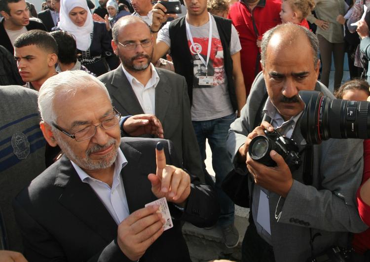 Præsident? Her ses partileder Rached Ghannouchi fra partiet Ennahda på valgdagen i søndags. Hans parti baserer dets politik på islam. 