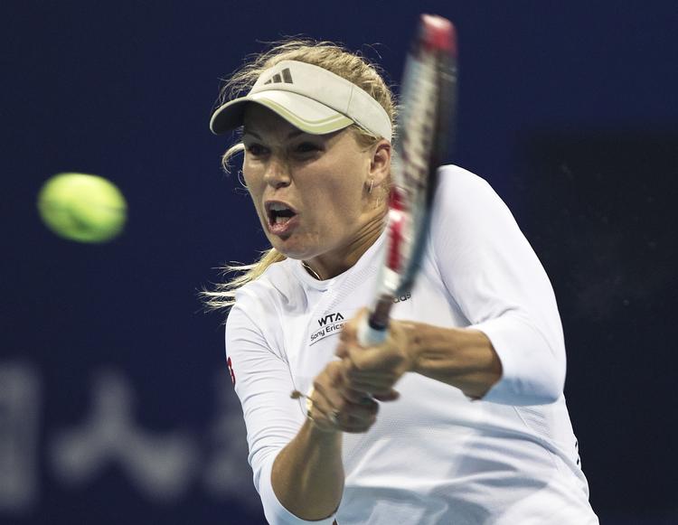 Trænerskifte. »I får ham at se til Australian Open«, lyder den korte kommentar fra Wozniacki. 