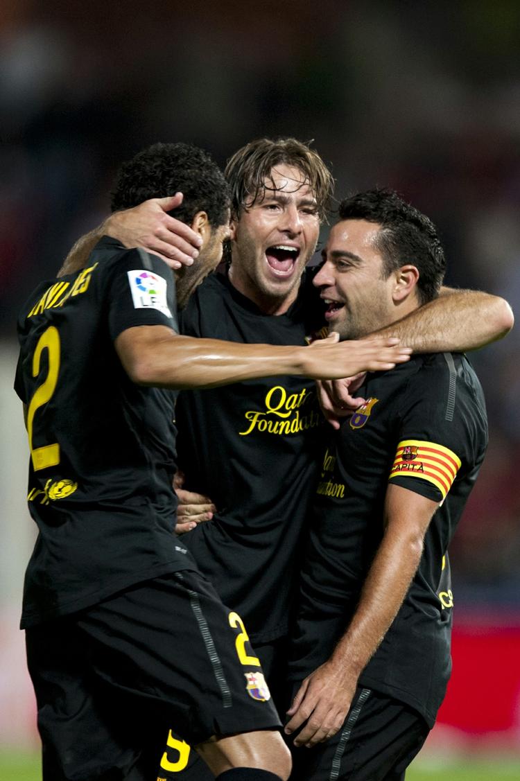 1-0. Xavi (t.h.) og Barca kan miste førstepladsen igen onsdag aften, hvor både Levante og Real Madrid skal i aktion. 