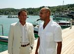 prominent. Saif al-Islam Gaddafi (th.) var sandsynligvis udset til at tage over efter sin far og repræsenterede ofte regimet. Her mødes han med den østrigske guvenør Jörg Haider i 2007. 