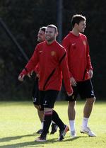 træning. Wayne Rooney (midt) kommer sandsynligvis i startopstillingen, når Manchester United onsdag møder Otelul Galati. 