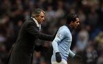 straffet. Manchester City-træner Roberto Mancini (tv) fik bægeret fuldt, da Carlos Tevez (th) nægtede at lade sig indskifte i et nederlag mod Bayern München. 