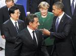 Topmøde. Et par af hovedrollerne i Cannes indtages af USA's præsident, Barack Obama, som her står sammen med Angela Merkel, Hu Jintao og Nicolas Sarkozy. 
