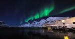 Farvespil. Nordlyset kan opleves i flere landet - her er det Tromsø i Norge. 