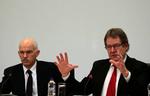 PES President Poul Nyrup Rasmussen (r) with George Papandreou during a meeting of European socialists earlier this year. Archive. 