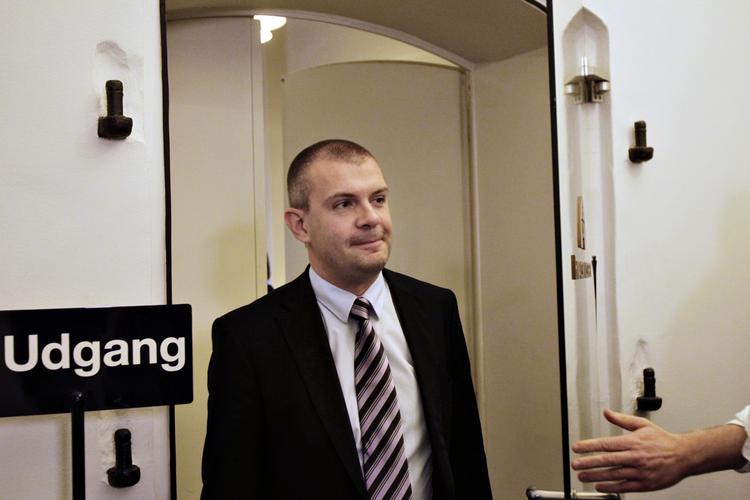 Finance Minister Bjarne Corydon (SocDem). The sign behind him says 'Way out'. Archive. 