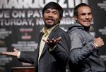 revanche. For tredje gang mødes Manny Pacquiao (tv.) og Juan Manuel Marquez i morgen. 