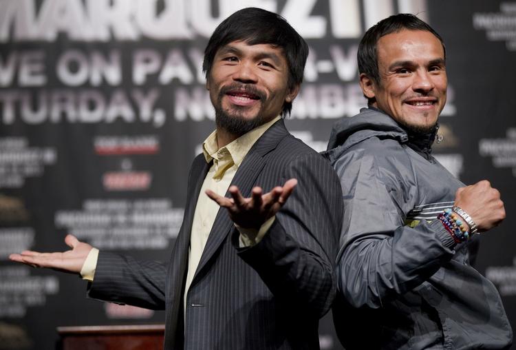 revanche. For tredje gang mødes Manny Pacquiao (tv.) og Juan Manuel Marquez i morgen. 