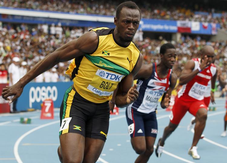 Kongen. Han kunne sagtens sætte verdensrekord på 400 meter, hvis han gad træne. Men det gør han ikke, vurderer Michael Johnson om Usain Bolt (t.v.) 