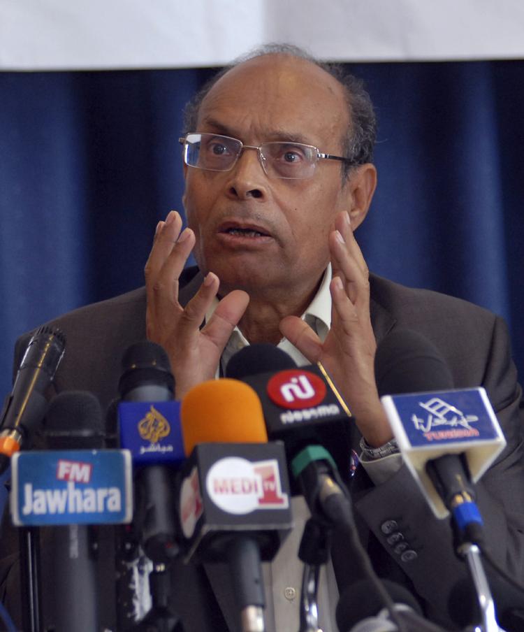 Magtmand. Moncef Marzouki er netop udnævnt som midlertidig præsident i Tunesien. 