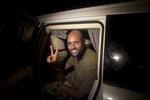 Efterfølger. Saif al-Islam Gaddafi holdt længe humøret højt. Det ses han i august i Tripoli inden hovedstadens fald til oprørerne. 