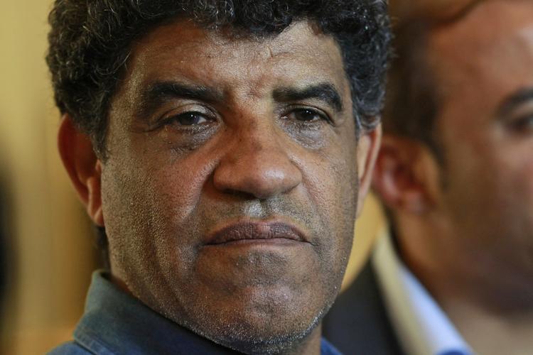 Retsopgør. Abdullah al-Senoussi ses her under et pressemøde i Tripoli i august. I dag sluttede hans flugt. 