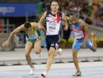 Sur. David 'Dai' Greene ( midten) mener, han er mere olympisk end fodboldspillerne. 
