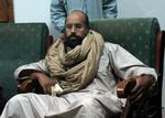 Fanget. Saif al-Islam fotograferet i weekenden, efter at han blev taget til fange af de nye magthavere i Libyen. 