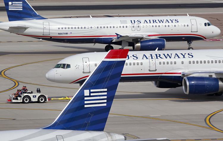 Overvægt. En US Airways-passager er vred over, at han måtte stå op under syv timers flyvning. 