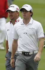 Trofæjagt. Rory McIlroy (forrest) er irsk kaptajn og valgte allerede tilbage i juli at spille turneringen sammen med Graeme McDowell. 