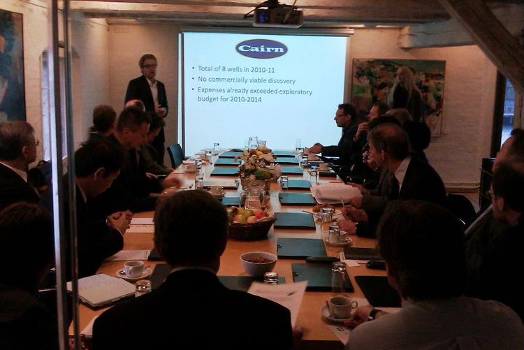 Greenpeace duped oil company executives into listening to a lecture on why they should not prospect for oil in Greenland. The real meeting they were supposed to be attending was taking place upstairs. 