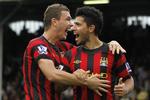 Stjerneduo. Edin Dzeko og Sergio Agüero (t.h.) er med transfersummer på ca. 220 og 320 millioner kroner to af de helt tunge drenge. 