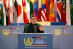 Den afghanske præsident sagde til de mere end 1.000 delegerede, at hand regering vil bekæmpe korruption og tilstræbe nationale forsoning 
