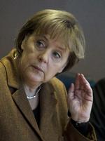 Forhandlinger. Merkel og Sarkozy er klar til at forhandle så længe, det måtte være nødvendigt på topmødet torsdag og fredag. 