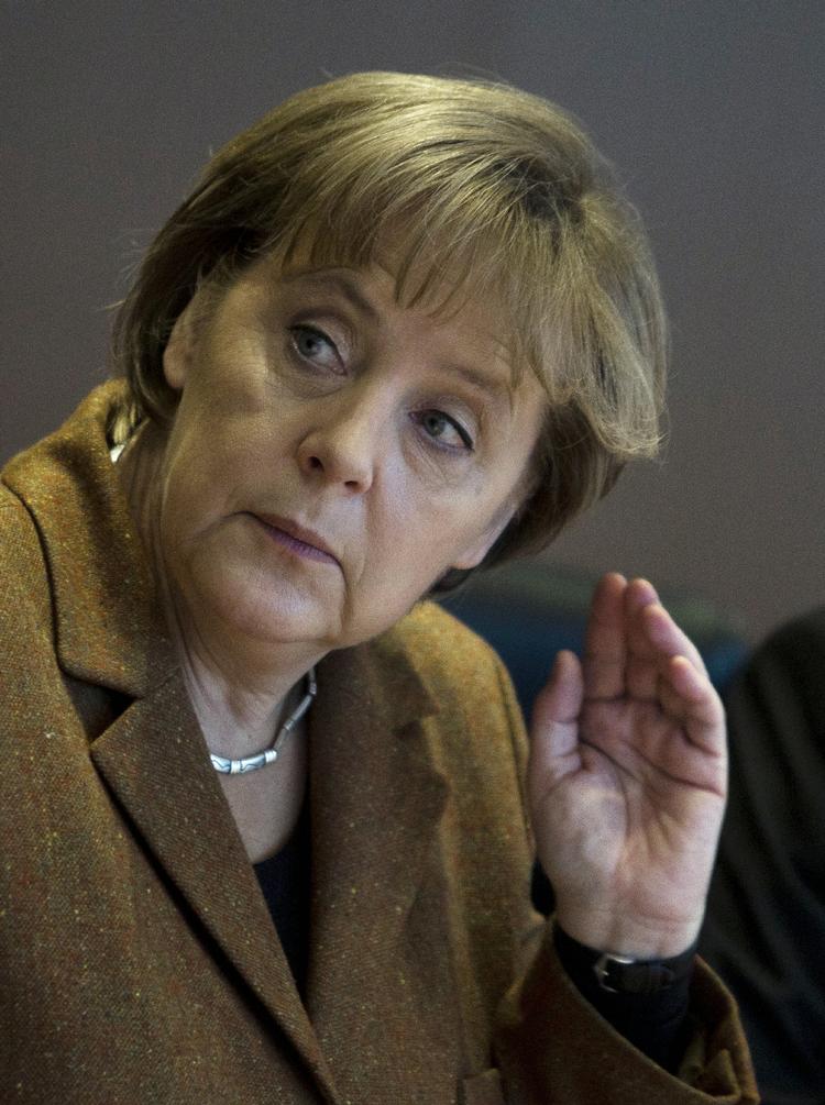 Forhandlinger. Merkel og Sarkozy er klar til at forhandle så længe, det måtte være nødvendigt på topmødet torsdag og fredag. 