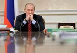Premierminister Vladimir Putin lægger skylden for demonstrationer på USA's udenrigsministerium. 