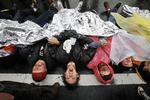global. Occypy-bevægelsen er blevet verdensomspændende. I sidste uge blev disse demonstranter arresteret i Washington. 