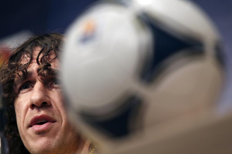 Titelbejlere. Carles Puyol og resten af Barca-stjernerne ankom til Japan i går. 